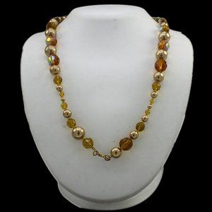 Golden imitation pearl and faceted chain necklace